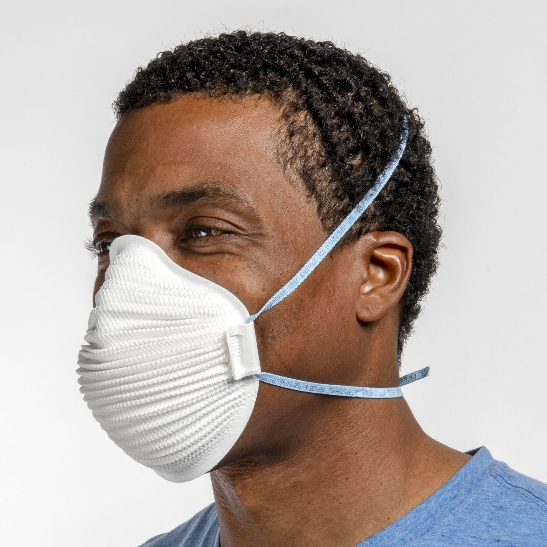 Man wearing medium large white Airwave 4600 NIOSH N95 respirator mask from Canada Strong Masks.